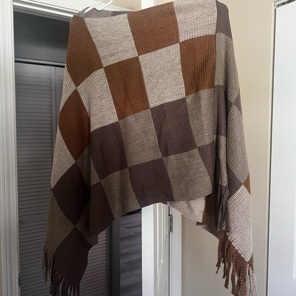 Poncho, brand new never worn.